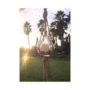 Handmade macramé plant/candle holder.